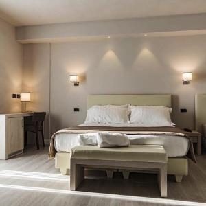 Een bed of bedden in een kamer bij Hotel Villa Barsanti