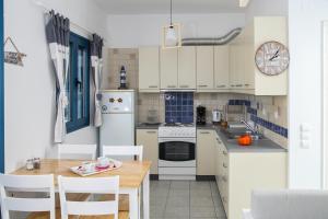 Kuchyň nebo kuchyňský kout v ubytování MMM Apartment