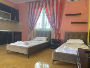 Postel nebo postele na pokoji v ubytování Duraj Apartment