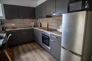 Küche/Küchenzeile in der Unterkunft Ferienwohnung TinyBeach