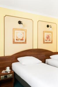 Posteľ alebo postele v izbe v ubytovaní Hotel Wersal