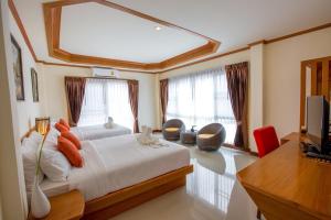TV a/nebo společenská místnost v ubytování Phurua Inn ภูเรือ อินน์ + 27 fotografií