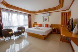 Postel nebo postele na pokoji v ubytování Phurua Inn ภูเรือ อินน์