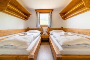 A bed or beds in a room at Salaš Syrex
