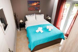 Postel nebo postele na pokoji v ubytování Luxurious Beach House, feels like home