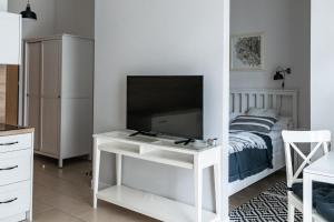 TV a/nebo společenská místnost v ubytování Apartamenty w Świnoujściu