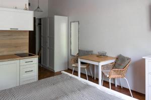 Kuchyň nebo kuchyňský kout v ubytování Apartamenty w Świnoujściu