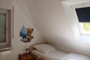 Postel nebo postele na pokoji v ubytování Ferienhaus Groß Popkenhausen