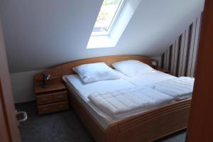 Postel nebo postele na pokoji v ubytování Ferienhaus Groß Popkenhausen