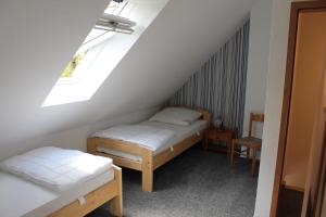 Postel nebo postele na pokoji v ubytování Ferienhaus Groß Popkenhausen