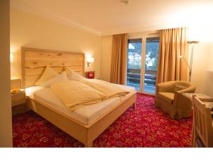 Postel nebo postele na pokoji v ubytování Gästehaus Schusser an der Therme, Frühstück inklusive, Doppelzimmer und Ferienwohnung