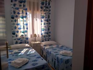 Postel nebo postele na pokoji v ubytování Villa Ingrid Costa Brava
