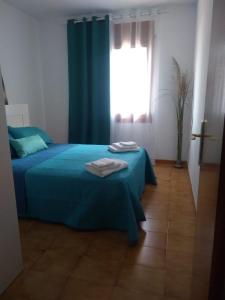 Postel nebo postele na pokoji v ubytování Villa Ingrid Costa Brava