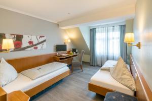 Posezení v ubytování Landhotel Zur Bretzel