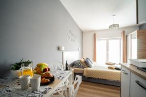 Postel nebo postele na pokoji v ubytování Apartament Perła Pienin