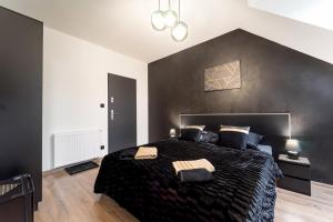 Postel nebo postele na pokoji v ubytování Apartament Perła Pienin