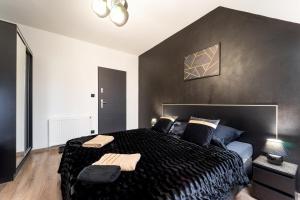 Postel nebo postele na pokoji v ubytování Apartament Perła Pienin