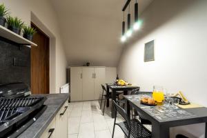Kuchyň nebo kuchyňský kout v ubytování Apartament Perła Pienin
