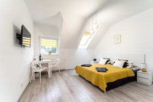 Postel nebo postele na pokoji v ubytování Apartament Perła Pienin