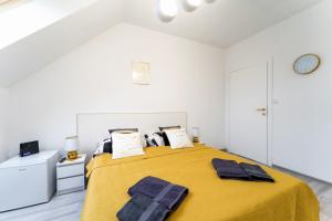 Postel nebo postele na pokoji v ubytování Apartament Perła Pienin