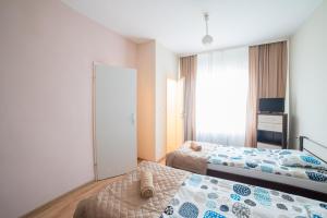 Posteľ alebo postele v izbe v ubytovaní Strzelec Noclegi