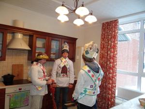 a group of three people in a kitchen at Villa Provans in Tatariv +66 photos