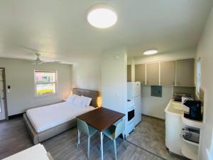 Kuchyň nebo kuchyňský kout v ubytování Rolo Beach Hotel
