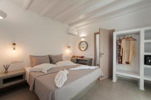Anemones Studios & Suites - Onar Hotels Collection客房内的一张或多张床位