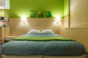 Postel nebo postele na pokoji v ubytování Sleeport