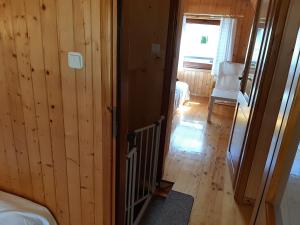Postel nebo postele na pokoji v ubytování Domki BLANKA Jastarnia