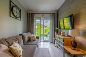 Posedenie v ubytovaní Apartament Leśniczówka - 5D Apartamenty