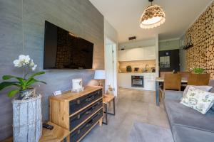 Posedenie v ubytovaní Apartament Leśniczówka - 5D Apartamenty
