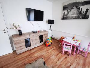 TV a/nebo společenská místnost v ubytování Privat Anna Liptov