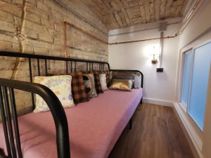 Posteľ alebo postele v izbe v ubytovaní The Address Loft 22ppl