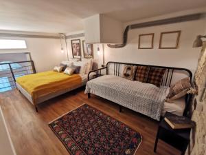 Posteľ alebo postele v izbe v ubytovaní The Address Loft 22ppl