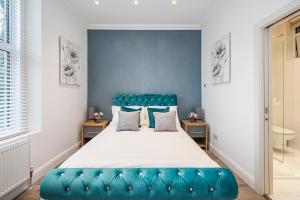 Voodi või voodid majutusasutuse Instagram-Worthy apartment in Central London toas