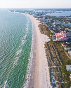 an aerial view of a beach and the ocean at Private room in a 2 bedroom 1 bathroom shared with host, on the beach, surrounded by resorts, only 2 people MAX in St Pete Beach