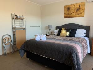 Ein Bett oder Betten in einem Zimmer der Unterkunft Short Stays Gippsland (Newborough)