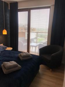 Postel nebo postele na pokoji v ubytování Apartament Komfortowy z klimatyzacja Plazowa 6 + 15 fotografií