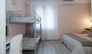 Postel nebo postele na pokoji v ubytování Hotel Monti