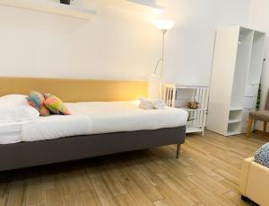 Voodi või voodid majutusasutuse Butterfly Suite Rome toas