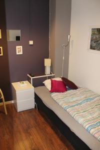Säng eller sängar i ett rum på City Lodge Stockholm