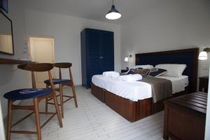 Postel nebo postele na pokoji v ubytování Le Tolde del Corallone