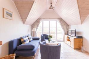 Μια τηλεόραση ή/και κέντρο ψυχαγωγίας στο Haus WINDFLÜCHTER Whg. LF 5.2