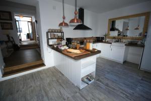 Kuchyň nebo kuchyňský kout v ubytování Casa Rural Miller's of Frigiliana