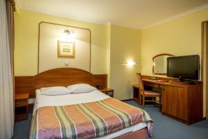 Posteľ alebo postele v izbe v ubytovaní Hotel Wersal