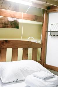 Postel nebo postele na pokoji v ubytování 艾迪行旅民宿