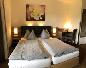 Letto o letti in una camera di Gasthof Süss