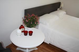 Posteľ alebo postele v izbe v ubytovaní Residence Ancona