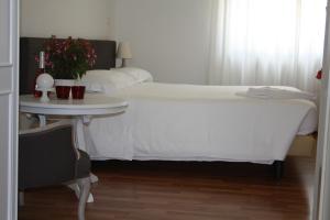 Posteľ alebo postele v izbe v ubytovaní Residence Ancona